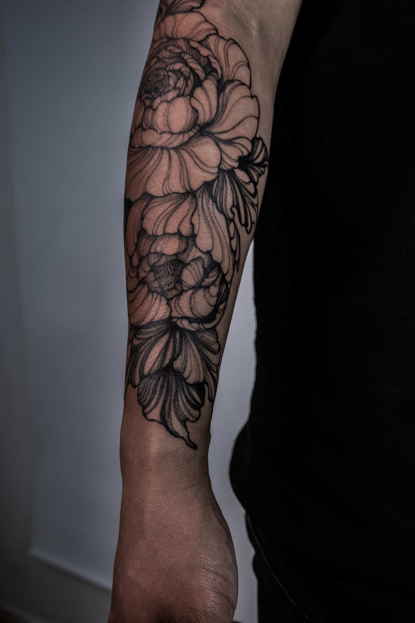 Freehand mid-size floral tattoo